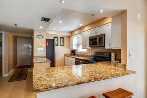 Condo, Multiple Beds (Villa Madeira 301 - Premier) | Private kitchen | Oven, toaster - Villa Madeira 301 - Premier (Madeira Beach)