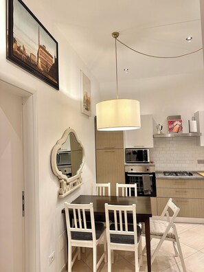 Apartment | Private kitchen | Full-size fridge, microwave, oven, stovetop - Vacanze Romane Laterano (Rome)