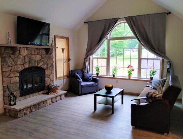 Smart TV, fireplace, foosball