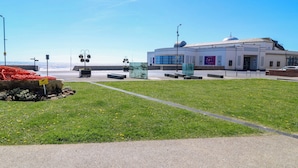 A building with a dome and a signboard. - Apt 8 @ Hunter's Quay (Bridlington)