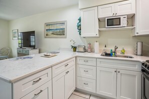 Condo, 1 King Bed with Sofa bed (Beach Quarters #6) | Private kitchen | Oven, toaster - Beach Quarters #6 (Gulfport)