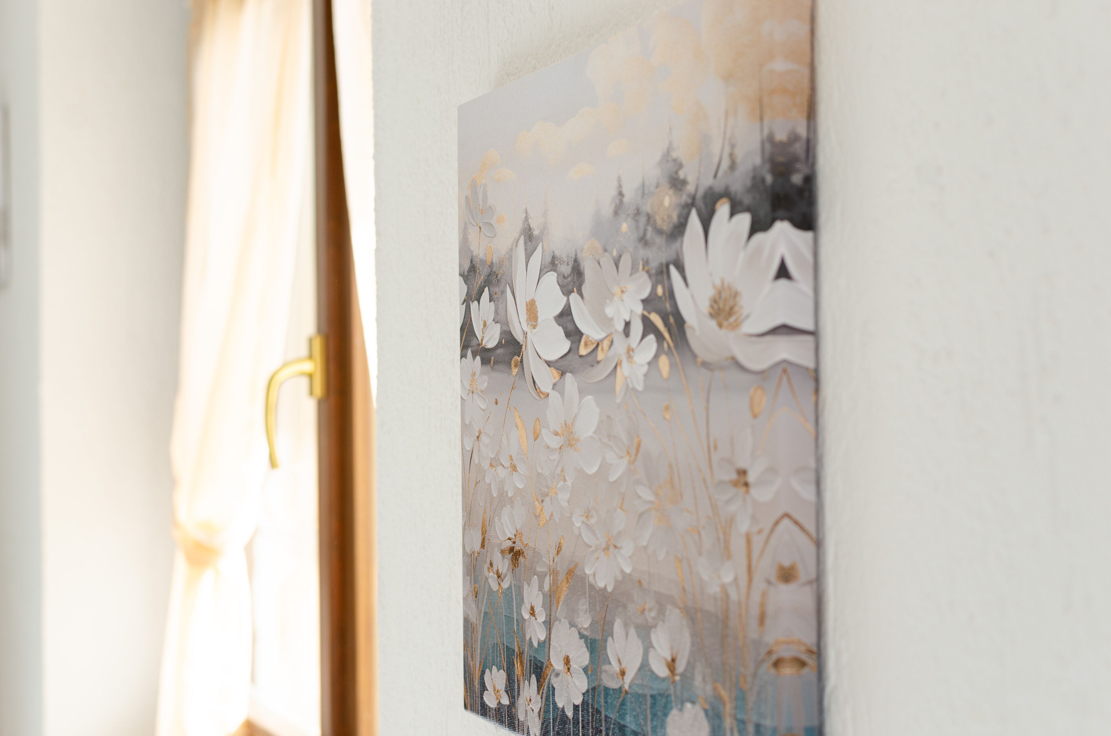 A wall with a floral artwork.