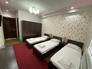 3 chambres, fer et planche à repasser, Wi-Fi, draps fournis