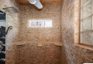 Shower, towels, soap, toilet paper