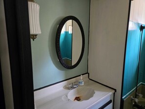 Shower, eco-friendly toiletries, soap, toilet paper