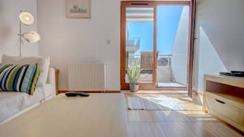 Apartemen Standar | 1 kamar tidur, setrika/meja setrika, Wi-Fi gratis, dan seprai linen