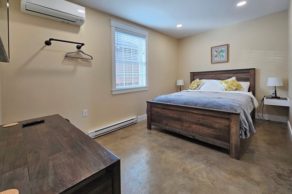 Bedroom with Queen bed, AC, and a 55 inch Smart TV