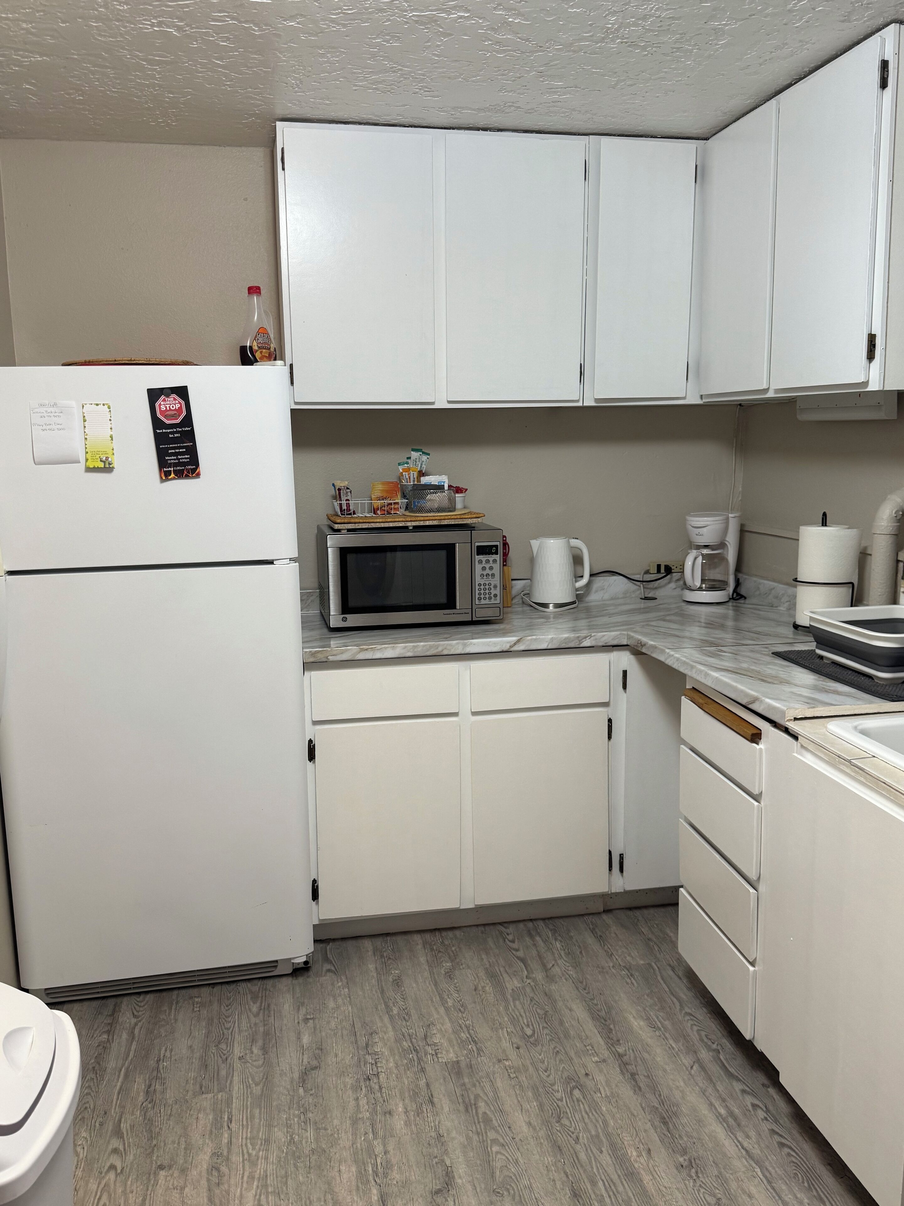 Fridge, microwave, coffee/tea maker, toaster