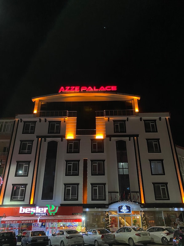 A multi-story building with a prominent sign reading "AZTE PALACE". - Sivas Azze Palace Otel (Sivas)