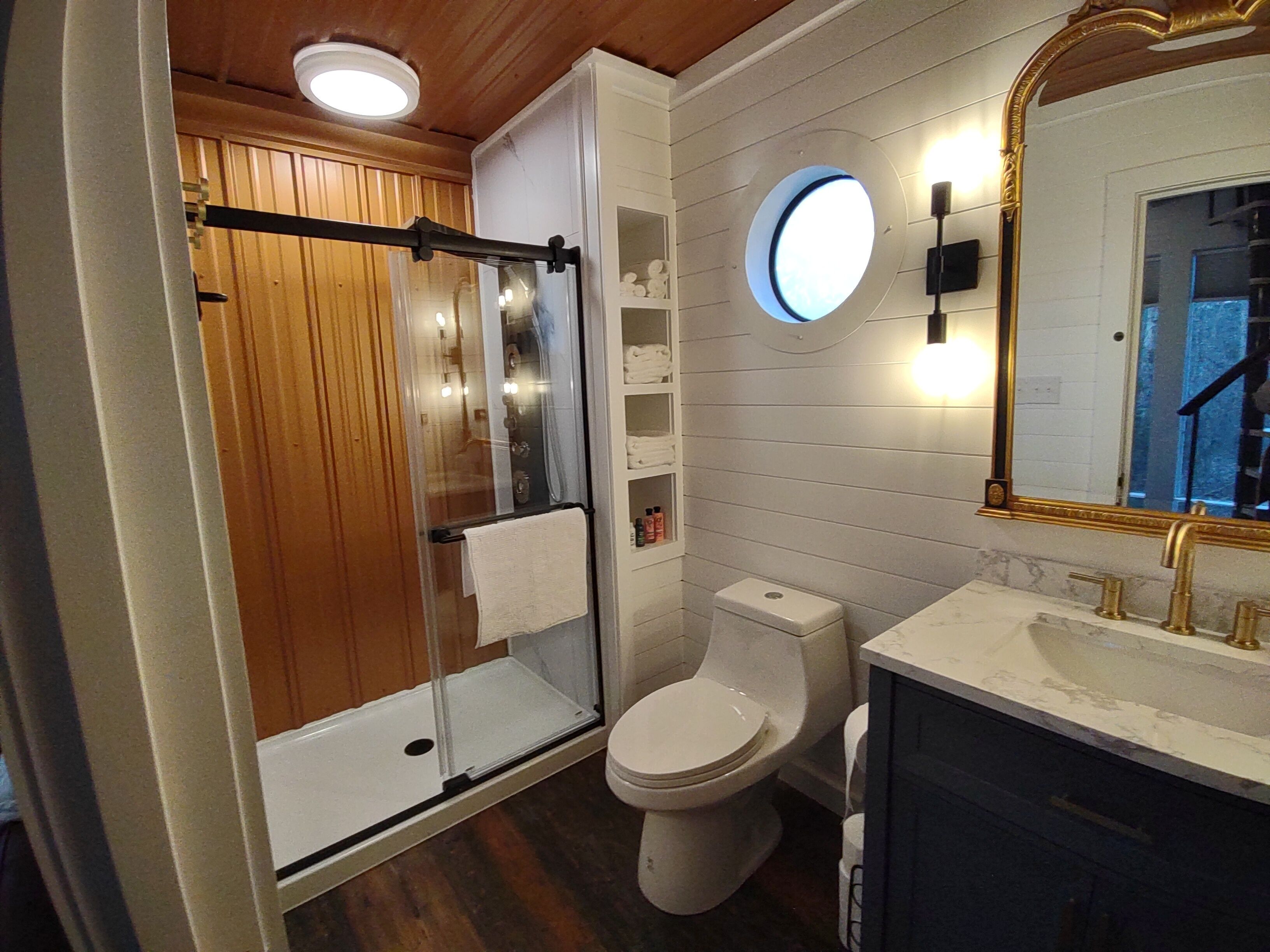 Shower, towels, toilet paper