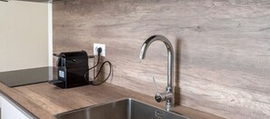 Een koelkast, een oven, een vaatwasser