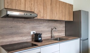 Een koelkast, een oven, een vaatwasser