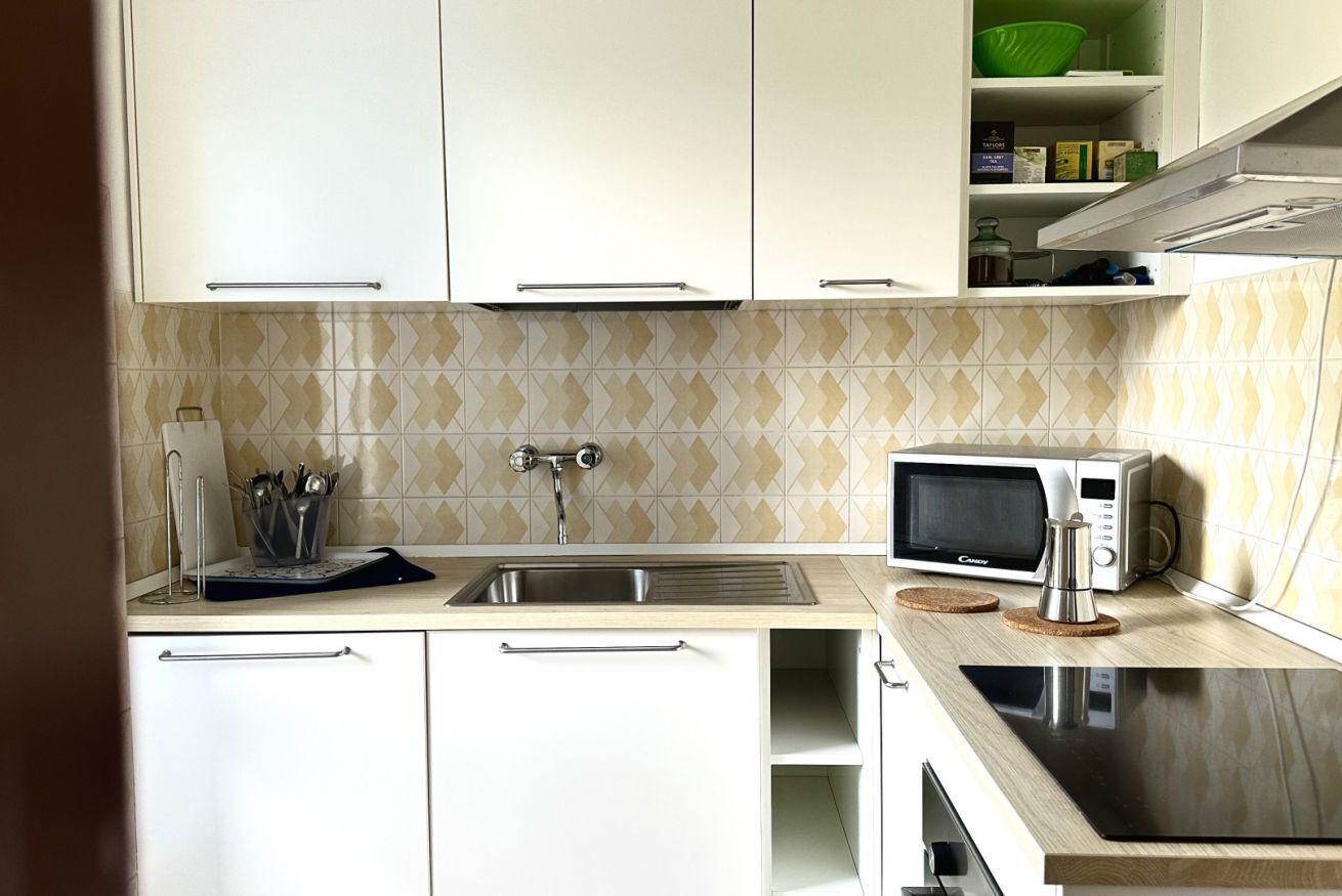 Fridge, oven, dining tables