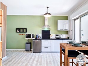 Fridge, microwave, coffee/tea maker, electric kettle