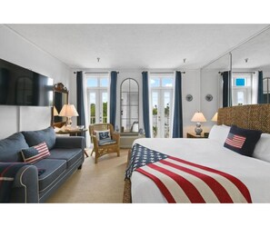 Sunny studio with sofa and king bed