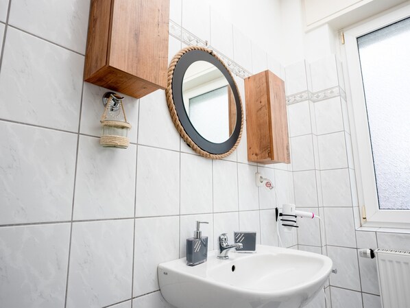 Hair dryer, towels, toilet paper