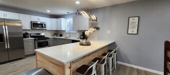 Elegant & Spacious Home with large fence in back yard with garage.