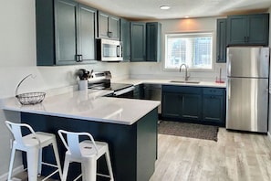 Fridge, microwave, oven, stovetop - 5381- Sol-T-Escape - Wake to Ocean Views | Oceanfront KDH Condo (Kill Devil Hills)