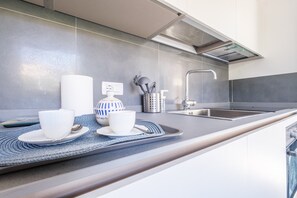 Refrigerador, horno, placa de cocina, lavavajillas