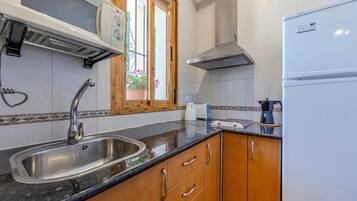 Fridge, microwave, stovetop, electric kettle