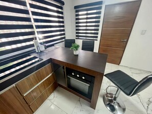 Deluxe Apartment | Private kitchen | Full-sized fridge, microwave, oven, rice cooker - AHAU Apartments (Playa del Carmen)