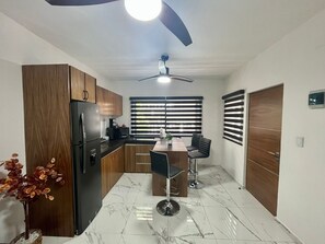 Deluxe Apartment | Private kitchen | Full-size fridge, microwave, oven, rice cooker - AHAU Apartments (Playa del Carmen)