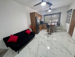 Deluxe Apartment | Living area | Flat-screen TV - AHAU Apartments (Playa del Carmen)