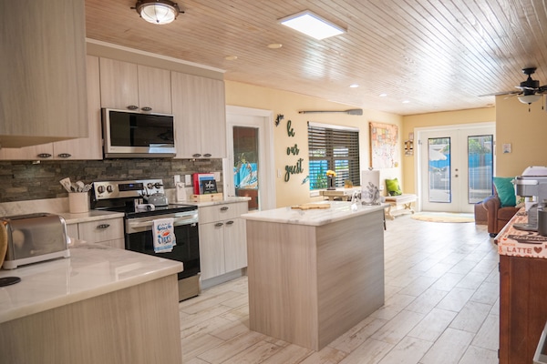 Updated kitchen off game room with Island. Open concept throughout.
