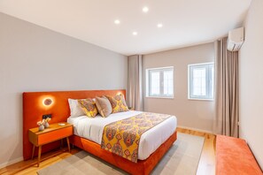 1 bedroom, desk, iron/ironing board, travel crib