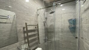 Basic Room, 3 Twin Beds | Bathroom | Bathrobes, slippers, towels, soap - veagat b&b (Tashkent)