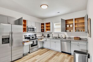 Cookware/dishes/utensils, spices, dining tables - Pet-Friendly 2BR Greer Home, King Beds & Fire Pit (Greer)