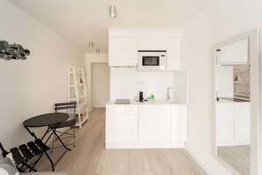 Fridge, microwave, coffee/tea maker, toaster