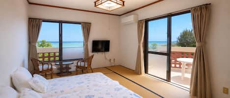 Traditional Twin Room, Beach View | Laptop workspace, WiFi (free), bed sheets