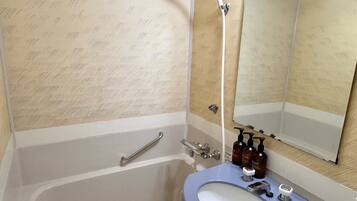 Hair dryer, slippers, towels, shampoo