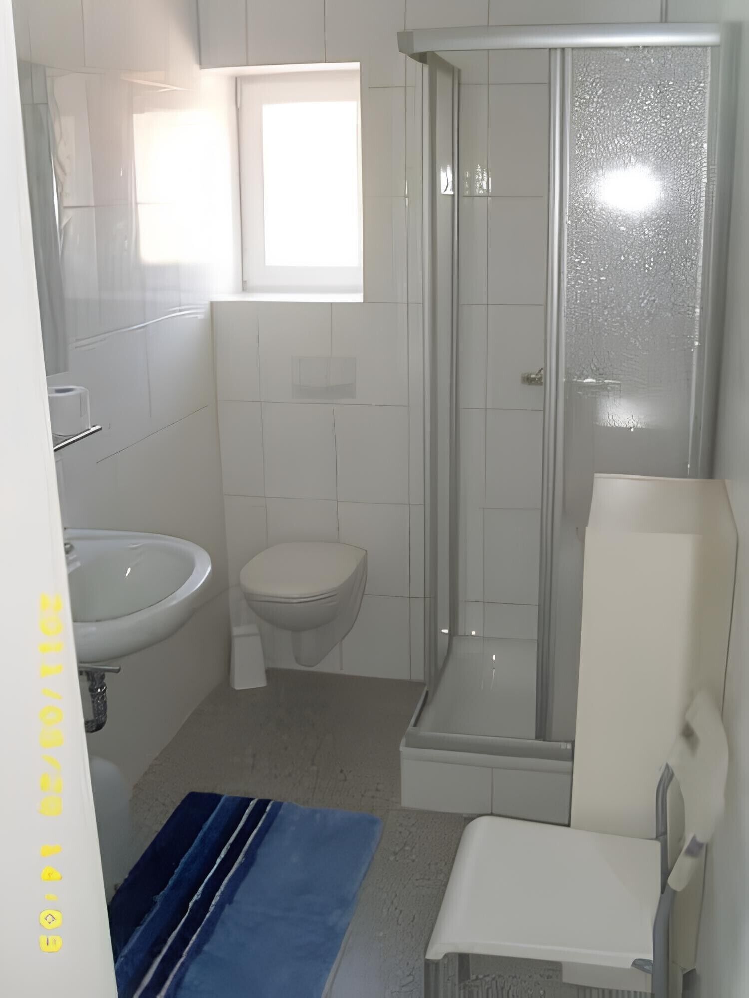 Ducha, secador de pelo y toallas