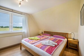 2 dormitorios, tabla de planchar con plancha, wifi gratis y ropa de cama