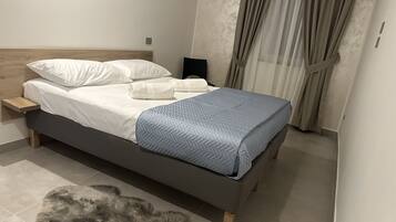 1 chambre, fer et planche à repasser, Wi-Fi gratuit, draps fournis