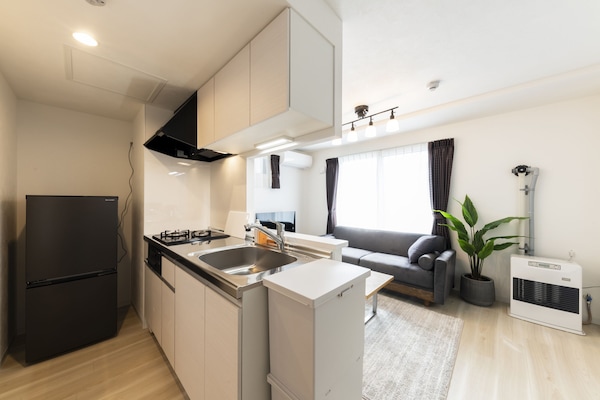 Apartment | Private kitchen | Full-size fridge, microwave, stovetop, electric kettle