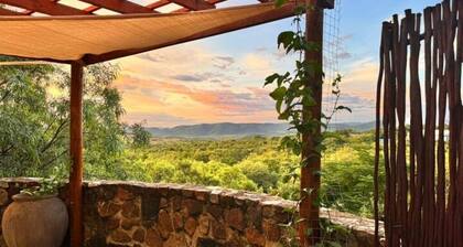 Private & peaceful country cottage bordering the Rhenosterspruit Nature Reserve.