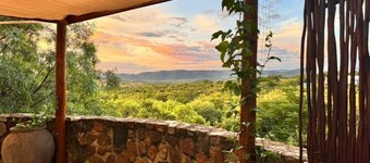 Private & peaceful country cottage bordering the Rhenosterspruit Nature Reserve.