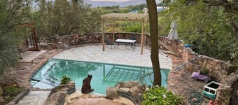 Private & peaceful country cottage bordering the Rhenosterspruit Nature Reserve.
