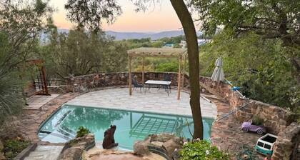 Private & peaceful country cottage bordering the Rhenosterspruit Nature Reserve.