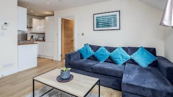 Standard Apartment | Living area | 43-inch Smart TV with digital channels, Netflix, streaming services