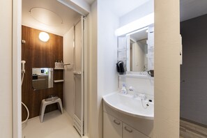 Appartement Affaires | Salle de bain | Articles de toilette (gratuits), séchoir à cheveux, pantoufles