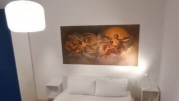 2 habitaciones, tabla de planchar con plancha, cuna de viaje y wifi