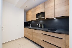 Apartment | Private kitchen | Full-size fridge, microwave, stovetop, espresso maker - Vienna Stay Apartments Linzerstrasse (Vienna)