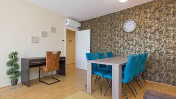 Apartment, Non Smoking | Living area | Flat-screen TV