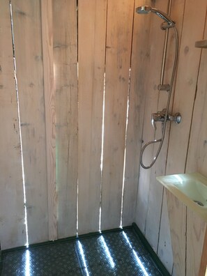 Shower, eco-friendly toiletries, towels, soap