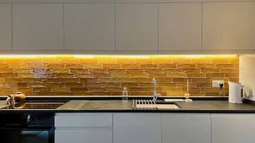 Apartment, 1 Bedroom (Y Cwt Mochyn) | Private kitchen | Oven, electric kettle, toaster, eco-friendly cleaning products
