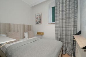 Apartment, 1 Bedroom, Kitchen | 1 bedroom, bed sheets - Poznań Stylish Grey by Renters (Poznan)